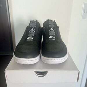 Nike Black and White Athletic Shoes with Low-Top Design